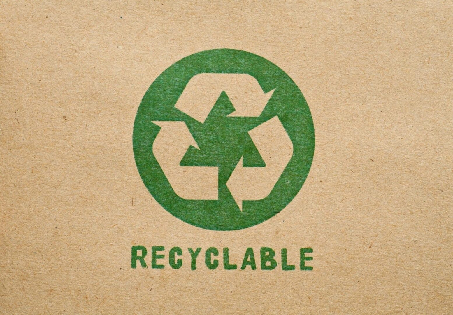 Recycle symbol on beige background